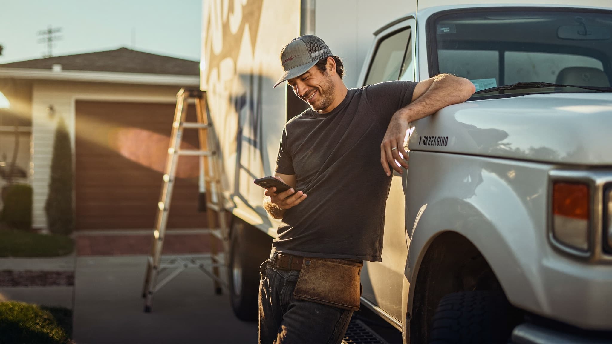 A contractor texting Bayena from his job site